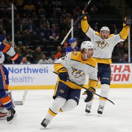 Dec 17, 2019; Uniondale, NY, USA; Nashville Predators center Craig Smith (15) celebrates his goal against the New York Islanders with center Colton Sissons (10) during the first period at Nassau Veterans Memorial Coliseum. Mandatory Credit: Brad Penner-USA TODAY Sports