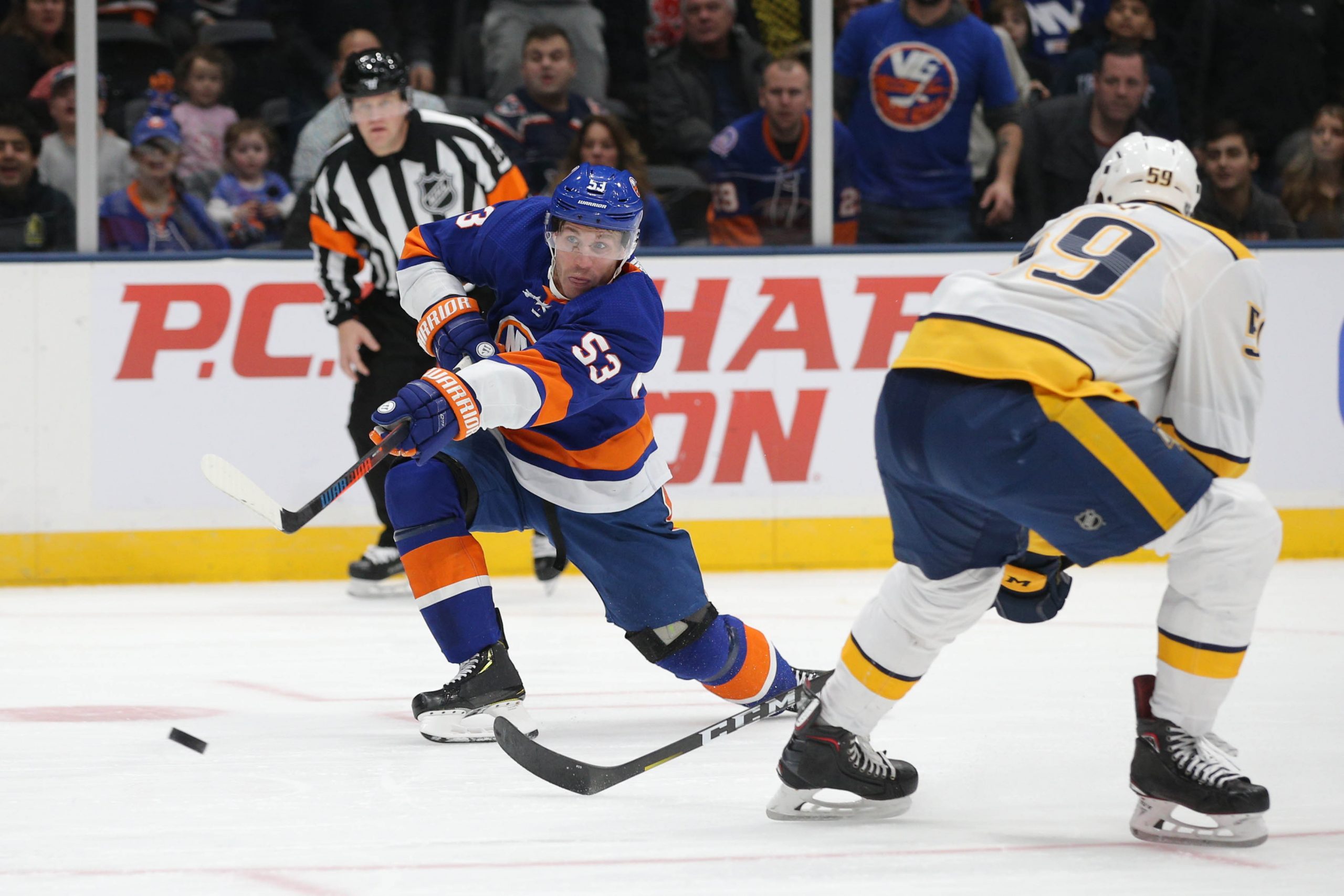 Dec 17, 2019; Uniondale, NY, USA; New York Islanders center Casey Cizikas (53) scores a goal against Nashville Predators defenseman Roman Josi (59) during the second period at Nassau Veterans Memorial Coliseum. Mandatory Credit: Brad Penner-USA TODAY Sports