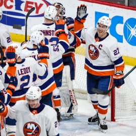 Dec 29, 2019; Saint Paul, Minnesota, USA; New York Islanders forward Anders Lee (27) celebrates with teammates following the game against the Minnesota Wild at Xcel Energy Center. Mandatory Credit: Brace Hemmelgarn-USA TODAY Sports