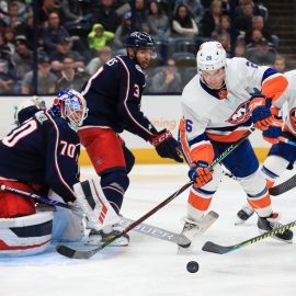 Oct 19, 2019; Columbus, OH, USA; Columbus Blue Jackets goaltender Joonas Korpisalo (70) attempts a save against New York Islanders right wing Oliver Wahlstrom (26) in the third period at Nationwide Arena. Mandatory Credit: Aaron Doster-USA TODAY Sports
