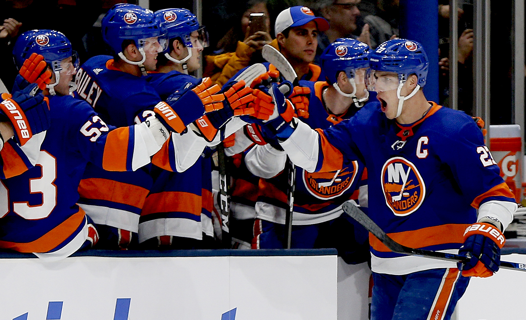 Jan 6, 2020; Brooklyn, New York, USA; New York Islanders left wing Anders Lee (27) is congratulated after scoring the game winning goal against the Colorado Avalanche at NYCB Live in Uniondale New York.. Mandatory Credit: Andy Marlin-USA TODAY Sports