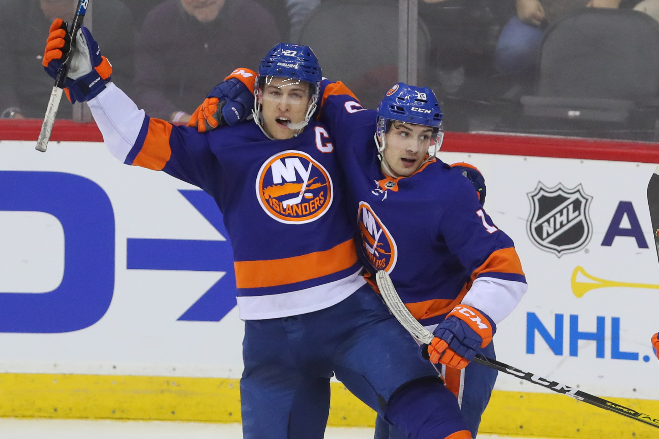 Jan 7, 2020; Newark, New Jersey, USA; New York Islanders left wing Anders Lee (27) celebrates his game winning goal during overtime at Prudential Center. The New York Islanders defeated the New Jersey Devils 4-3. Mandatory Credit: Ed Mulholland-USA TODAY Sports