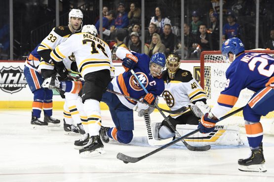 Jan 11, 2020; Brooklyn, New York, USA; New York Islanders center Brock Nelson (29) and left wing Anders Lee (27) attempt a shot on goal against Boston Bruins goaltender Tuukka Rask (40) during the second period at Barclays Center. Mandatory Credit: Sarah Stier-USA TODAY Sports
