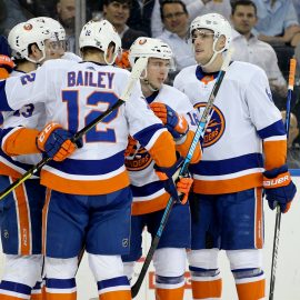 Jan 21, 2020; New York, New York, USA; New York Islanders left wing Anthony Beauvillier (18) celebrates with teammates after scoring a power play goal against the New York Rangers during the first period at Madison Square Garden. Mandatory Credit: Brad Penner-USA TODAY Sports