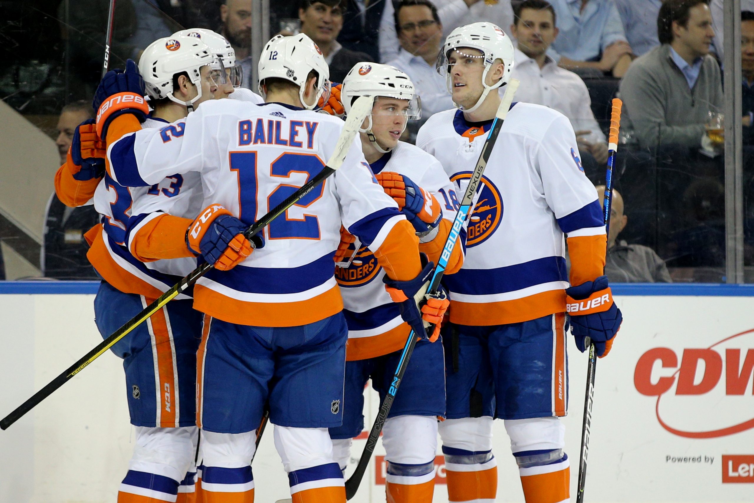 Jan 21, 2020; New York, New York, USA; New York Islanders left wing Anthony Beauvillier (18) celebrates with teammates after scoring a power play goal against the New York Rangers during the first period at Madison Square Garden. Mandatory Credit: Brad Penner-USA TODAY Sports
