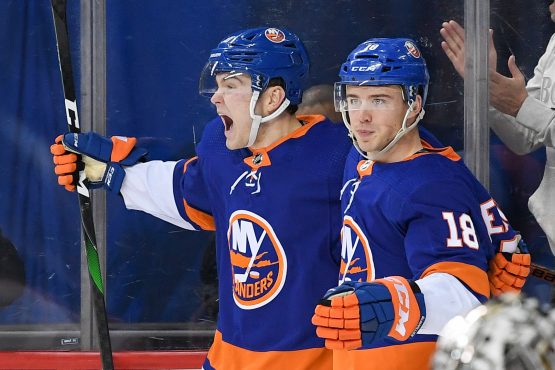 Feb 6, 2020; Brooklyn, New York, USA; New York Islanders left wing Kieffer Bellows (20) celebrates his first NHL goal with New York Islanders left wing Anthony Beauvillier (18) against the Los Angeles Kings during the second period at Barclays Center. Mandatory Credit: Dennis Schneidler-USA TODAY Sports