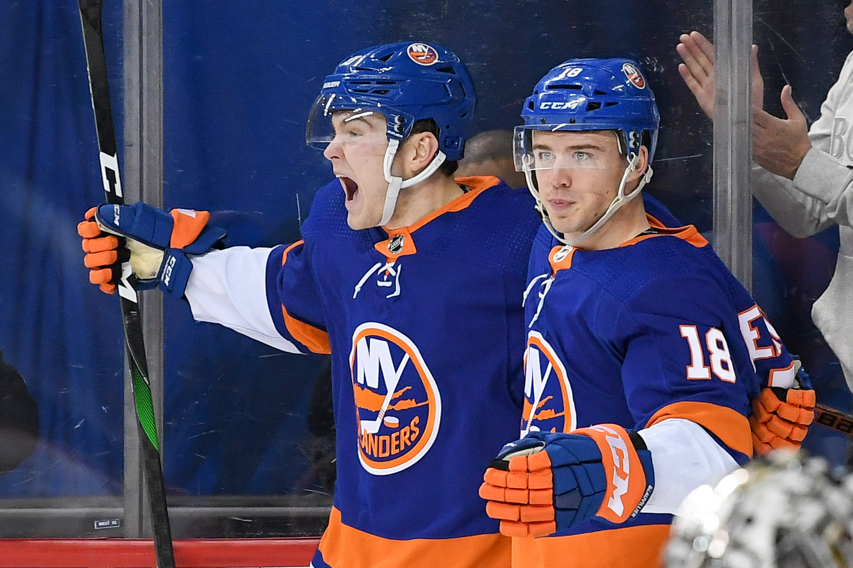Feb 6, 2020; Brooklyn, New York, USA; New York Islanders left wing Kieffer Bellows (20) celebrates his first NHL goal with New York Islanders left wing Anthony Beauvillier (18) against the Los Angeles Kings during the second period at Barclays Center. Mandatory Credit: Dennis Schneidler-USA TODAY Sports