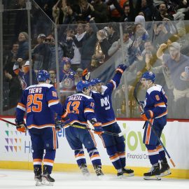 Feb 11, 2020; Brooklyn, New York, USA; New York Islanders defenseman Ryan Pulock (6) celebrates his game winning goal against the Philadelphia Flyers with teammates during the third period at Barclays Center. Mandatory Credit: Brad Penner-USA TODAY Sports