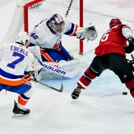 Feb 17, 2020; Glendale, Arizona, USA; Arizona Coyotes center Brad Richardson (15) shoots against New York Islanders goaltender Semyon Varlamov (40) during the second period at Gila River Arena. Mandatory Credit: Matt Kartozian-USA TODAY Sports
