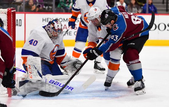 Feb 19, 2020; Denver, Colorado, USA; Colorado Avalanche left wing Matt Nieto (83) attempts to score past New York Islanders goaltender Semyon Varlamov (40) and defenseman Nick Leddy (2) in the second period at the Pepsi Center. Mandatory Credit: Ron Chenoy-USA TODAY Sports