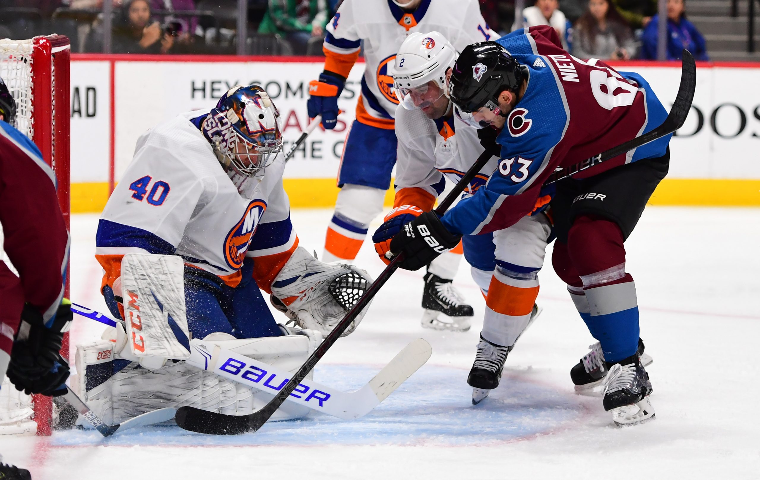Feb 19, 2020; Denver, Colorado, USA; Colorado Avalanche left wing Matt Nieto (83) attempts to score past New York Islanders goaltender Semyon Varlamov (40) and defenseman Nick Leddy (2) in the second period at the Pepsi Center. Mandatory Credit: Ron Chenoy-USA TODAY Sports