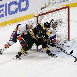 Feb 29, 2020; Uniondale, New York, USA; Boston Bruins left wing Brad Marchand (63) scores a goal against New York Islanders goaltender Semyon Varlamov (40) during the third period at Nassau Veterans Memorial Coliseum. Mandatory Credit: Andy Marlin-USA TODAY Sports