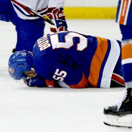 Mar 3, 2020; Brooklyn, New York, USA; New York Islanders defenseman Johnny Boychuk (55) lays on the ice after being injured against the Montreal Canadiens during the third period at Barclays Center. Mandatory Credit: Andy Marlin-USA TODAY Sports