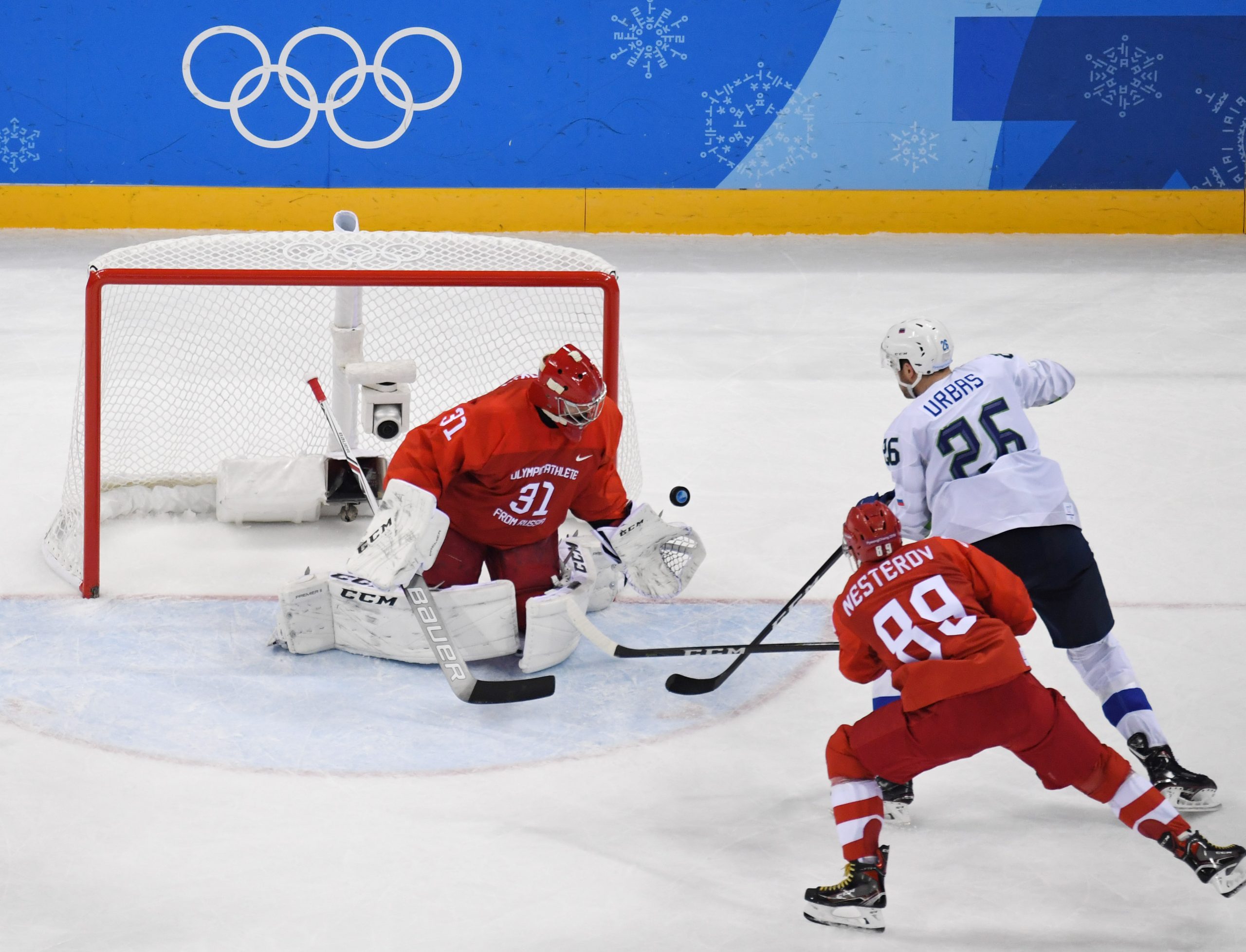 Feb 16, 2018; Gangneung, South Korea; Olympic Athlete of Russia goalkeeper Ilya Sorokin (31) makes a save from a shot by Slovenia forward Jan Urbas (26) during the third period at the Pyeongchang 2018 Olympic Winter Games at Gangneung Hockey Centre. Mandatory Credit: David E. Klutho-USA TODAY Sports