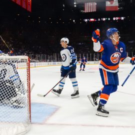Oct 6, 2019; Brooklyn, NY, USA; New York Islanders left wing Anders Lee (27) celebrates his goal against the Winnipeg Jets during the second period at Nassau Veterans Memorial Coliseum. Mandatory Credit: Dennis Schneidler-USA TODAY Sports