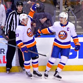 Dec 12, 2019; Sunrise, FL, USA; New York Islanders center Casey Cizikas (left) reacts after teammate left wing Anders Lee (right) scored an empty net gaol during the third period against the Florida Panthers at BB&T Center. Mandatory Credit: Steve Mitchell-USA TODAY Sports