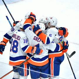 Feb 17, 2020; Glendale, Arizona, USA; New York Islanders left wing Anthony Beauvillier (18) celebrates with teammates after scoring a goal against the Arizona Coyotes in the third period at Gila River Arena. Mandatory Credit: Matt Kartozian-USA TODAY Sports