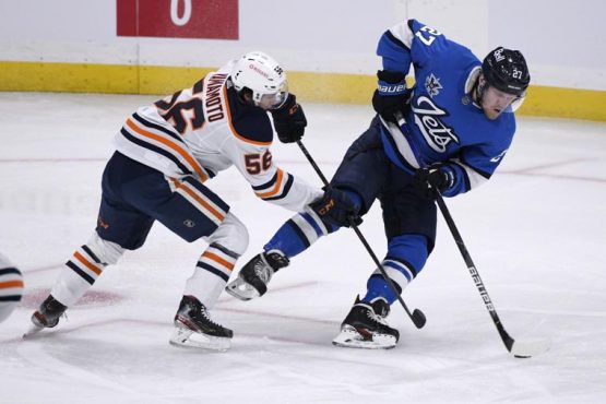 Oilers beat Jets