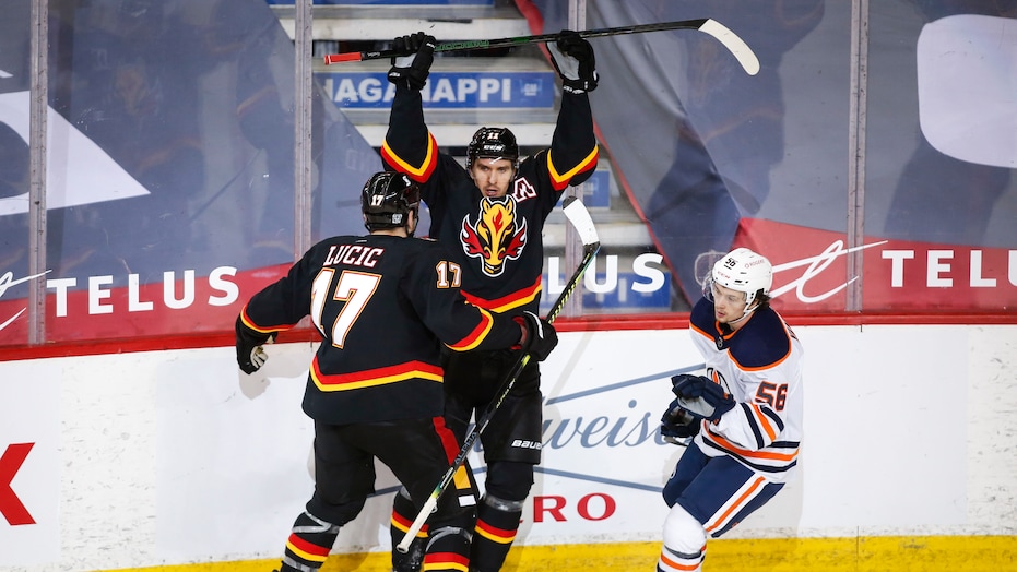 Flames beat Oil