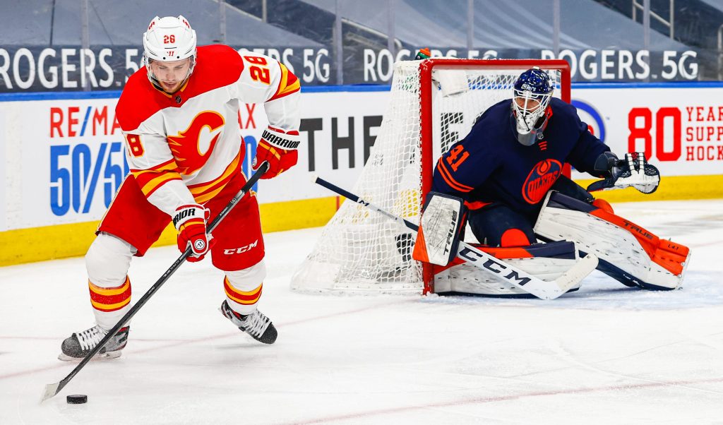 Flames beat Oilers