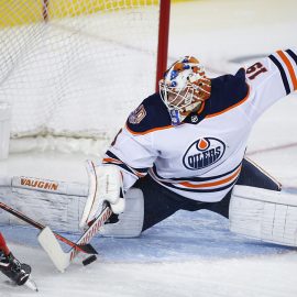 oilers-mikko-koskinen-makes-save-against-flames