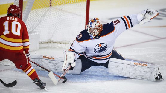 oilers-mikko-koskinen-makes-save-against-flames