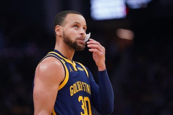 Stephen Curry of the Golden State Warriors chews on his mouthpiece.