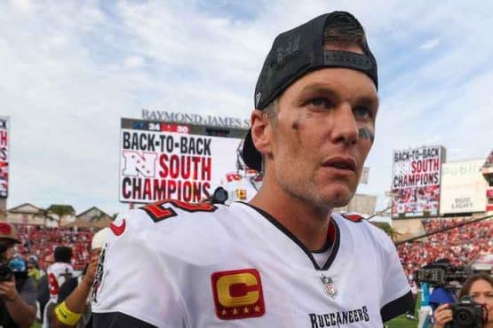 Tom Brady stares and walks off the field.