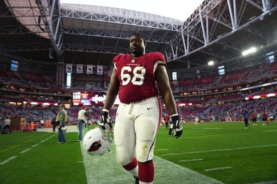 Arizona Cardinals offensive lineman Kelvin Beachum walks off field.