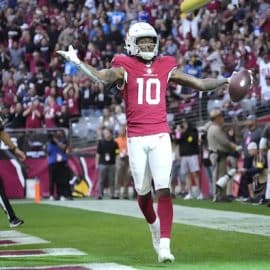 Arizona Cardinals wide receiver DeAndre Hopkins holds his hands up.