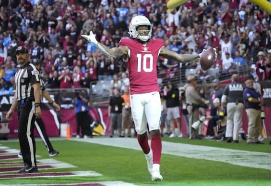 Arizona Cardinals wide receiver DeAndre Hopkins holds his hands up.
