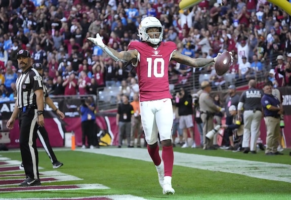 Arizona Cardinals wide receiver DeAndre Hopkins holds his hands up.