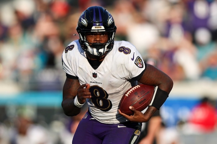 Baltimore Ravens quarterback Lamar Jackson runs.