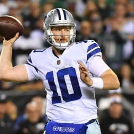 Dallas Cowboys quarterback Cooper Rush throws a pass.