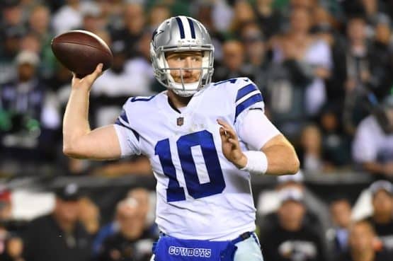 Dallas Cowboys quarterback Cooper Rush throws a pass.