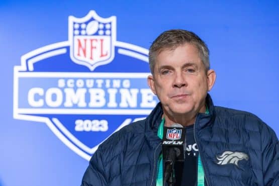 Denver Broncos coach Sean Payton stands at podium.