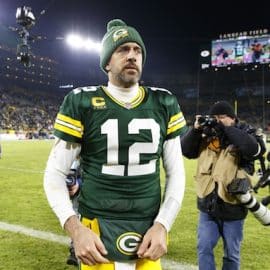 Green Bay Packers quarterback Aaron Rodgers walks.