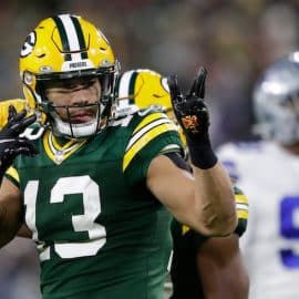 Green Bay Packers wide receiver Allen Lazard points.