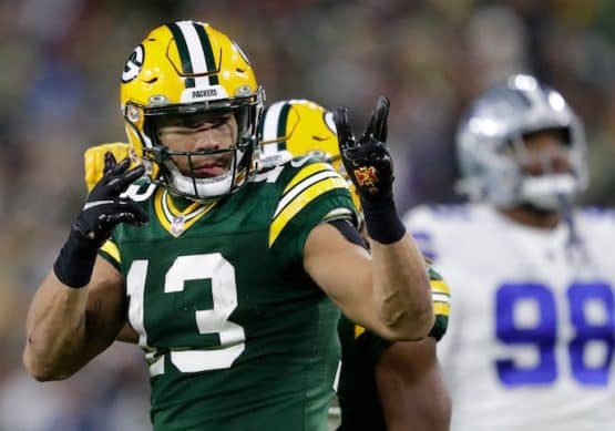 Green Bay Packers wide receiver Allen Lazard points.