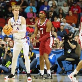 Kansas Jayhawks guard Gradey Dick holds the ball.