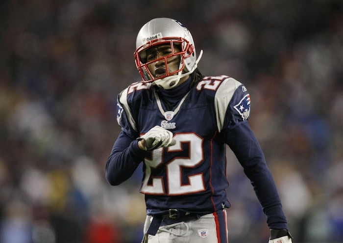 New England Patriots cornerback Asante Samuel touches his chest.