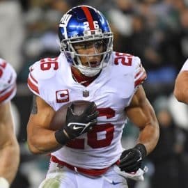New York Giants running back Saquon Barkley runs the ball.