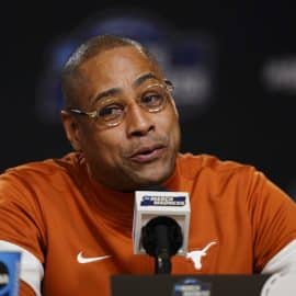 Texas Longhorns interim head coach Rodney Terry at the podium.
