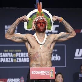 Alex Pereira gestures during weigh-ins for UFC 281.