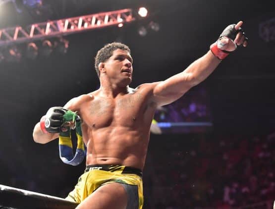Gilbert Burns points on top of the octagon.