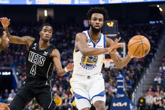 Golden State Warriors forward Andrew Wiggins passes the ball.