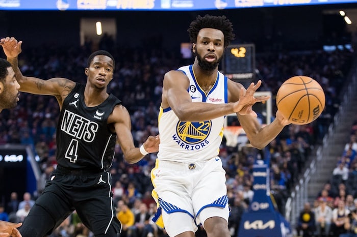 Golden State Warriors forward Andrew Wiggins passes the ball.