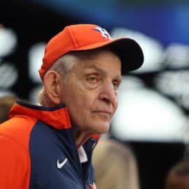 Mattress Mack looks and stares.