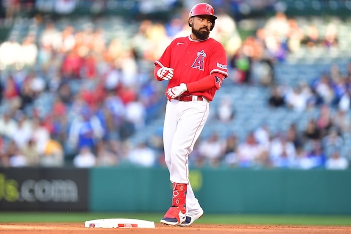 Los Angeles Angels third baseman Anthony Rendon stands on a base.