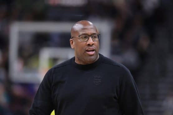 Mike Brown stands and stares.